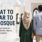 Visitors wearing modest clothing outside a mosque, illustrating appropriate attire for men and women visiting a mosque.